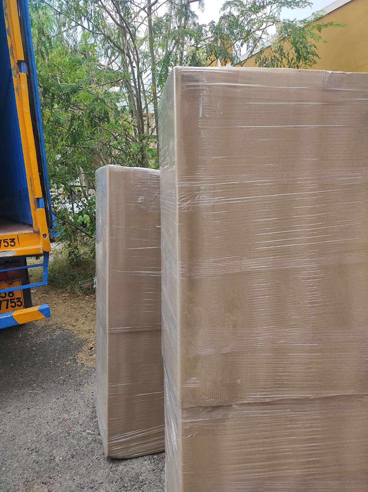 Courier working with parcels in warehouse